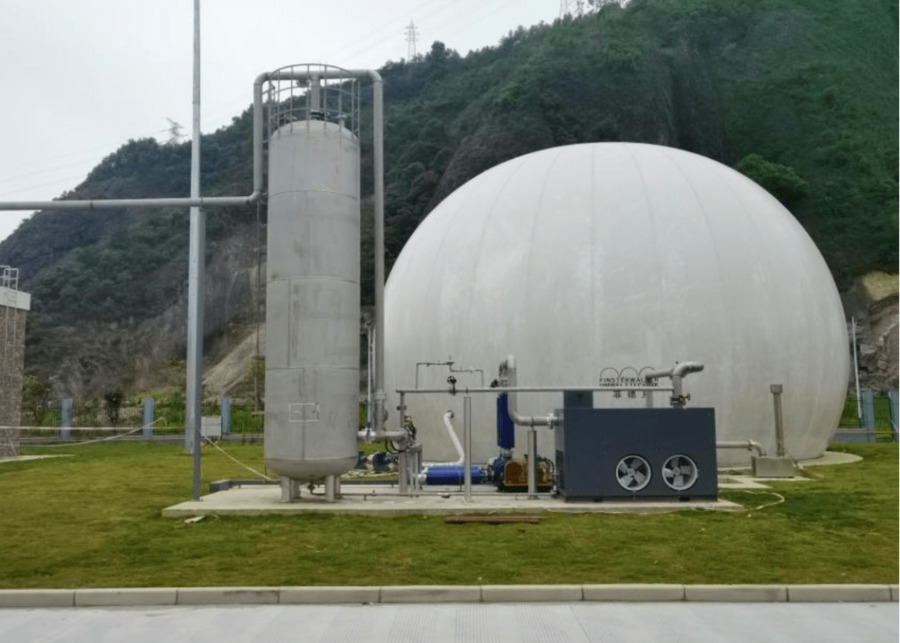 A concrete CSTR anaerobic digester on a small dairy farm.