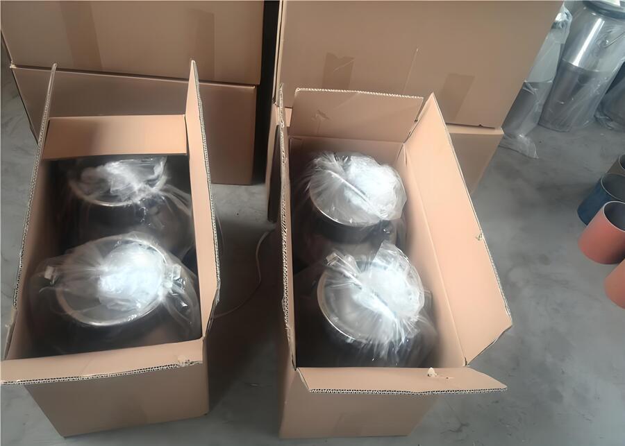 Mobile Milking System A mobile milking machine next to a stainless steel milk can