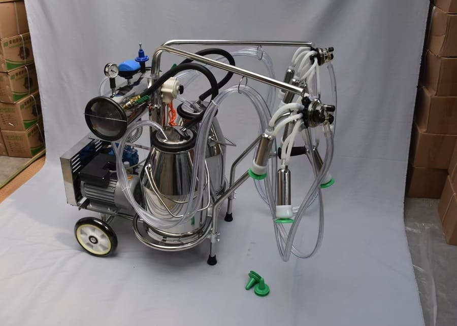 Portable Milking Machine for Small Farms A NexAgri portable milking machine with a stainless steel bucket