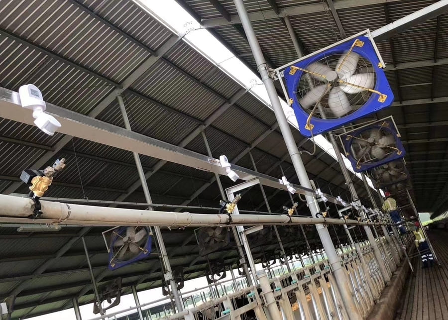 Close-up of a spray system controller and valves in a farm setting