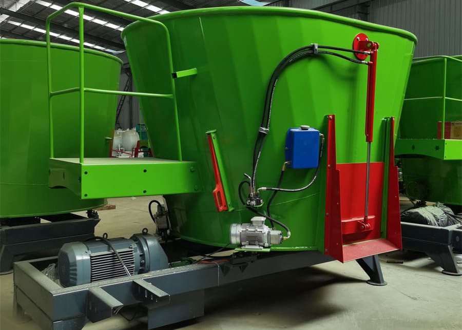 A TMR mixer working on a dairy farm