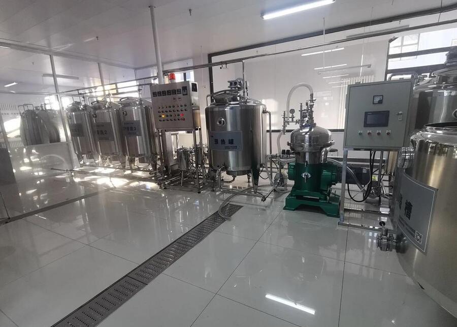 A stainless steel milk pasteurization and processing line in a clean facility