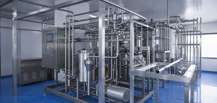 Skid-mounted pasteurization and fluid processing unit for fresh milk production line.
