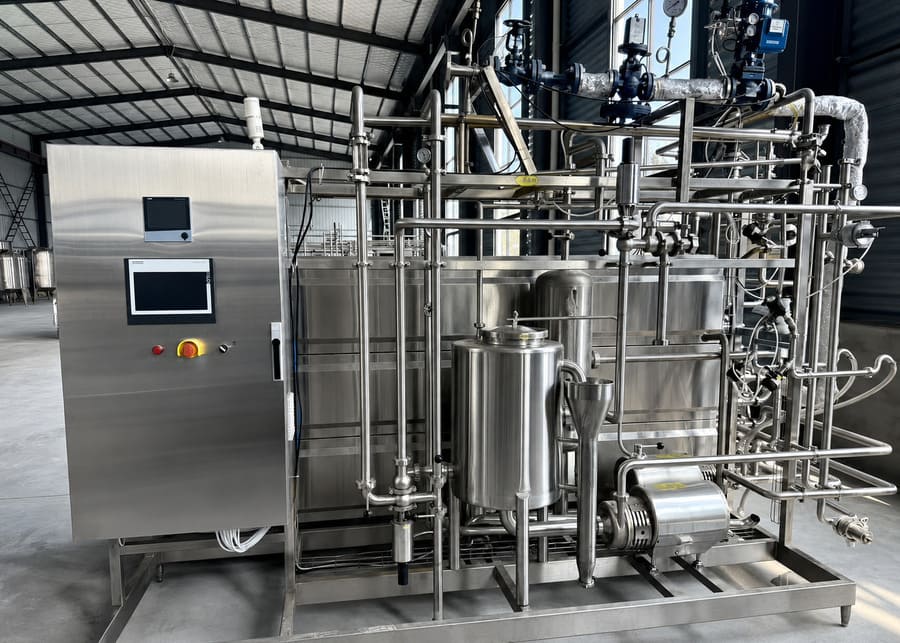 Milk Processing Equipment Options NexAgri integrated HTST plate pasteurizer unit with automation control panel