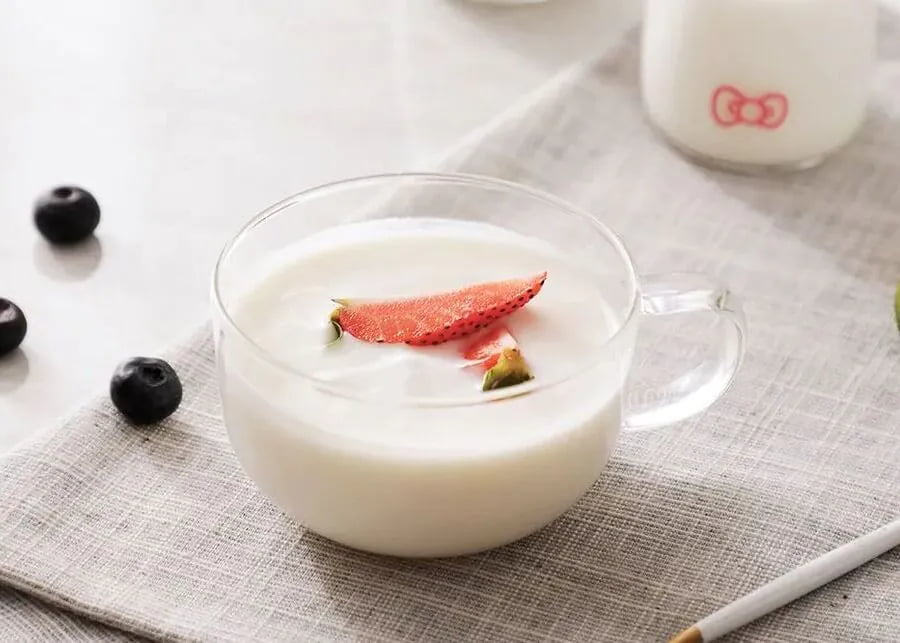 Industrial-grade processed yogurt with smooth and creamy texture after proper homogenization and pasteurization