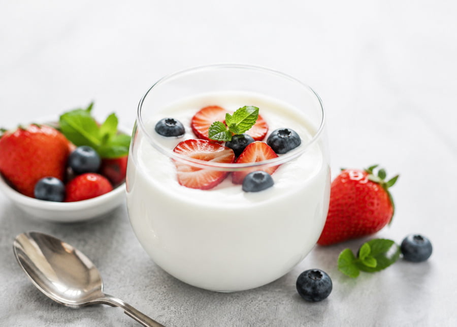 Fixing Sour Yogurt A glass of yogurt with fresh berries